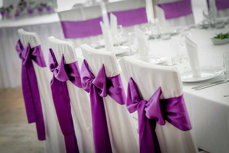 Plastic folding chairs - add elegance with sashes